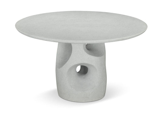 Concrete side table with unique design on a white background