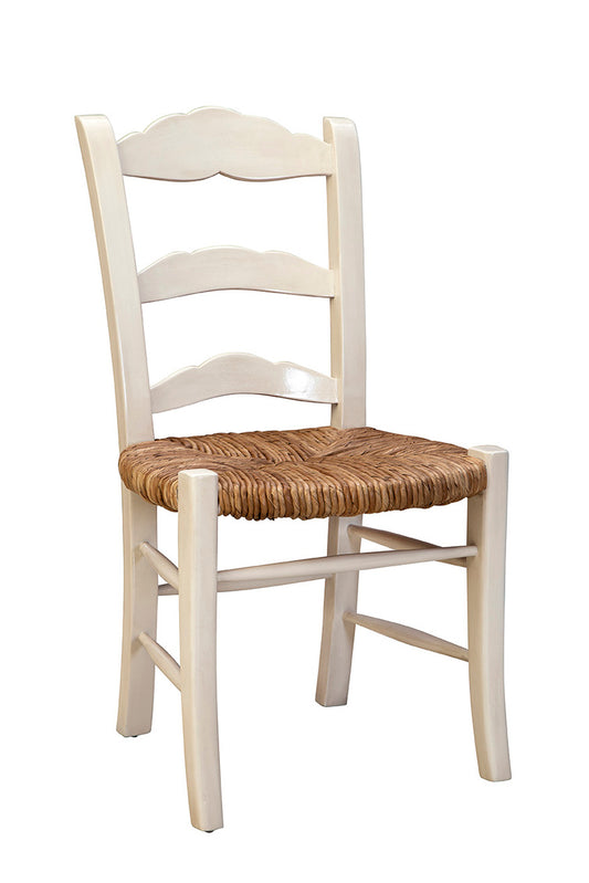 A cream-colored wooden ladderback side chair with a woven rush seat.