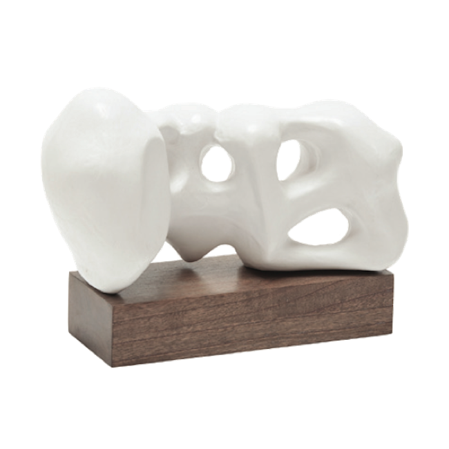 White abstract sculpture on a wooden base against a white background