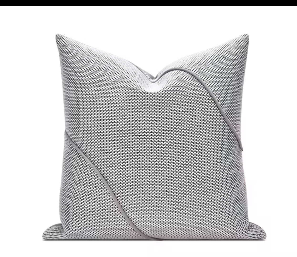 Gray textured pillow on a white background
