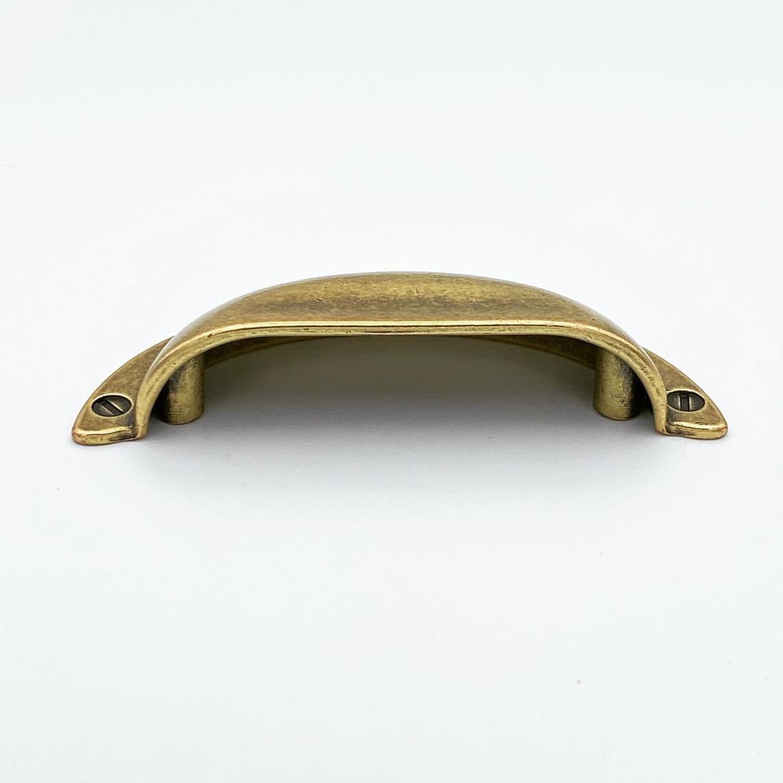 Bronze cabinet handle on a white background