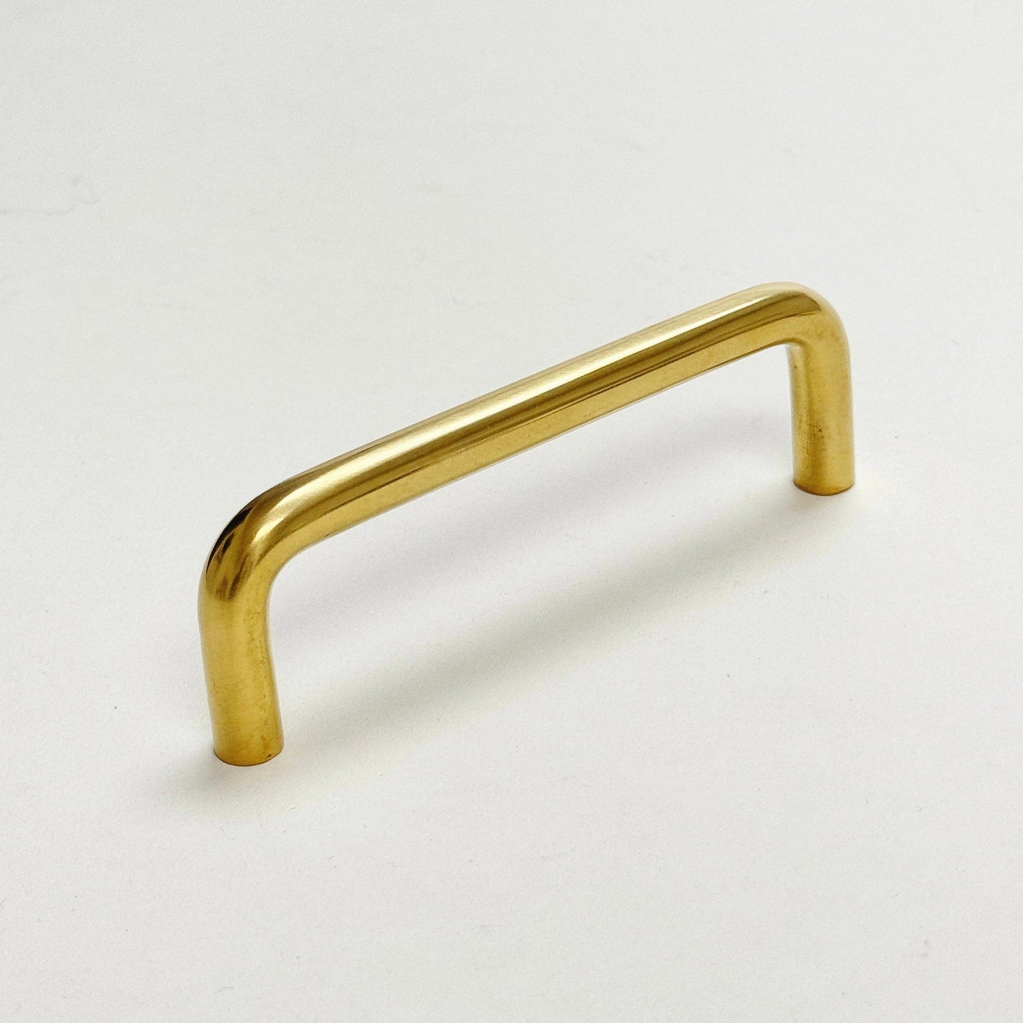 Unlacquered Brass "Tubular" Cabinet Knob and Wire Drawer Pulls