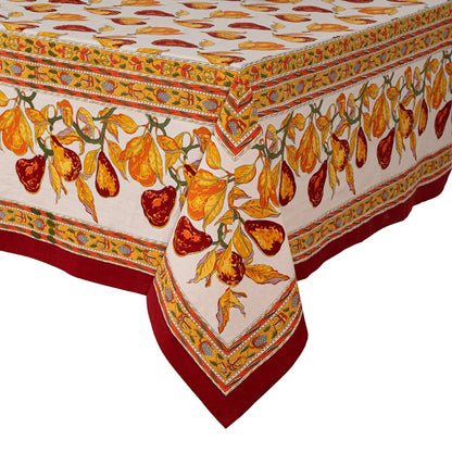 Decorative tablecloth with autumnal fruit and leaf pattern on a white background