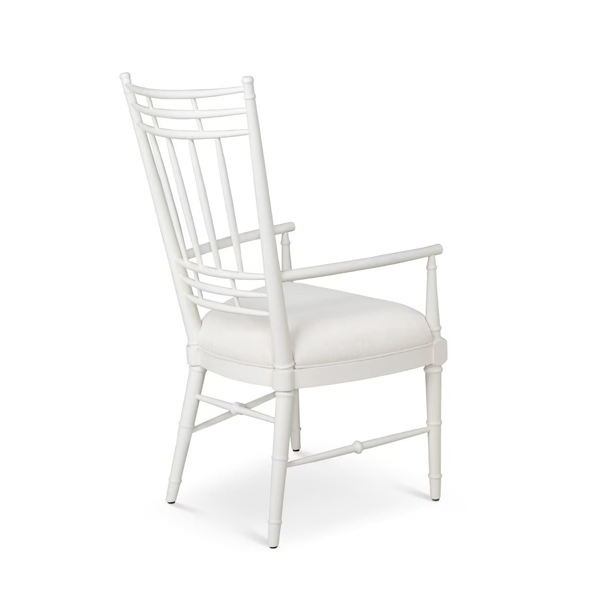 White chair with a cushioned seat on a white background