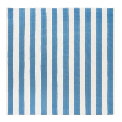 Blue and white striped rug on a white background