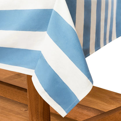 Blue and white striped tablecloth on a wooden table