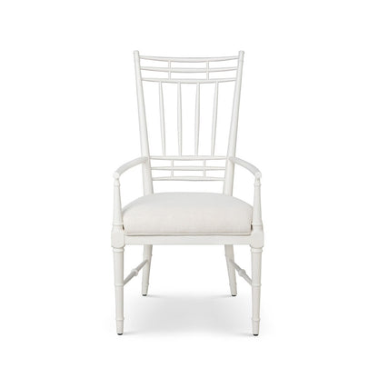 White chair with a cushioned seat on a white background