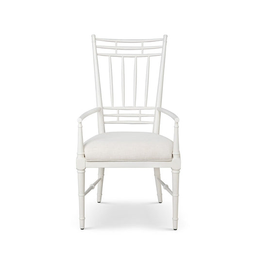 White chair with a cushioned seat on a white background