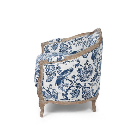 Decorative armchair with blue floral pattern on a white background