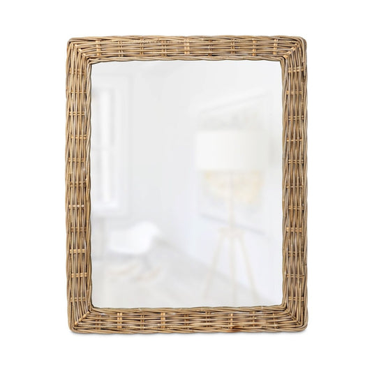 Rectangular mirror with a wicker frame on a white background