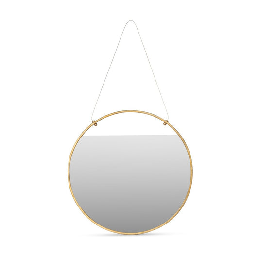 Round mirror with gold frame hanging on a white background