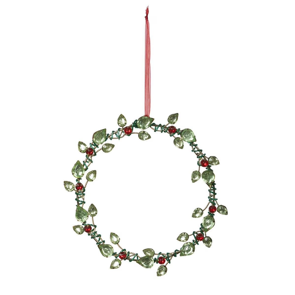 Decorative wreath ornament with green leaves and red berries on a white background