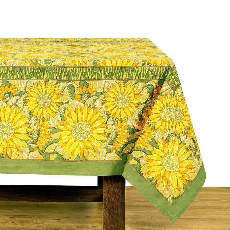 Tablecloth with sunflower pattern on a wooden table