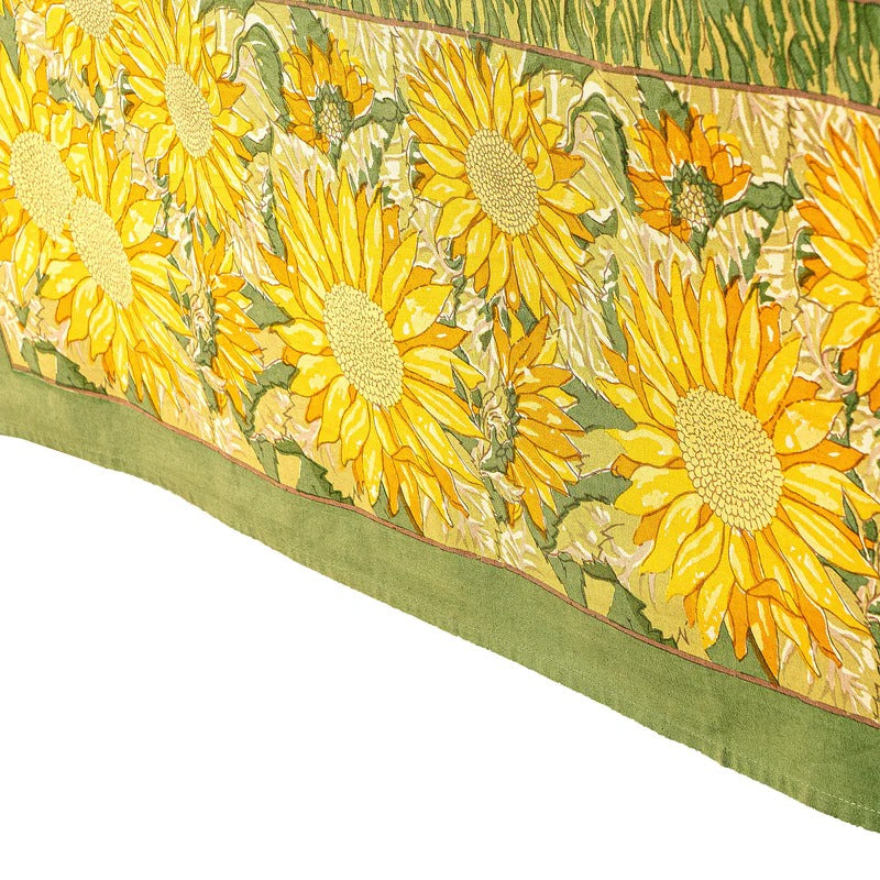 Decorative table runner with sunflower pattern on a white background