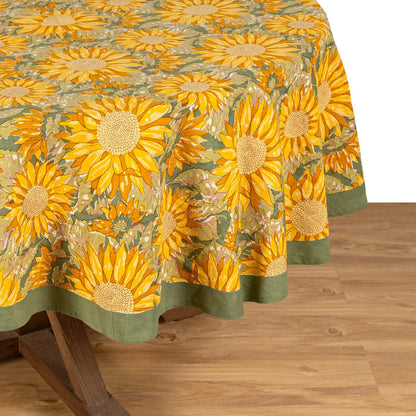 Sunflower patterned tablecloth on a wooden table