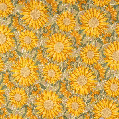 Pattern of yellow sunflowers on a green background