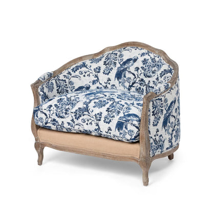 Decorative armchair with blue floral pattern on a white background