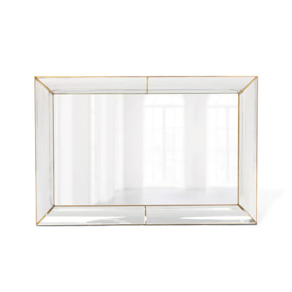 Rectangular mirror with gold frame on a white background