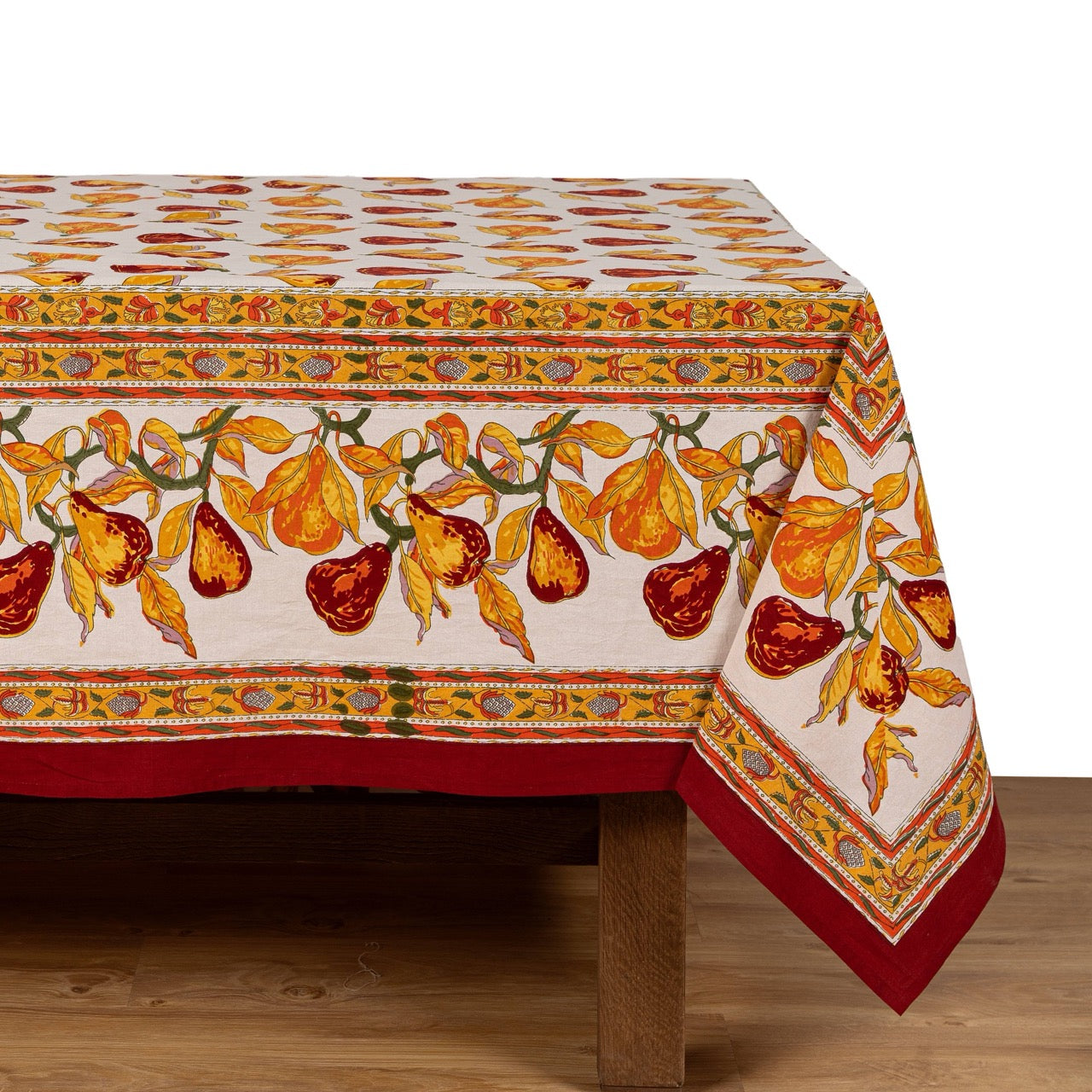 Decorative tablecloth with fruit pattern on a wooden table