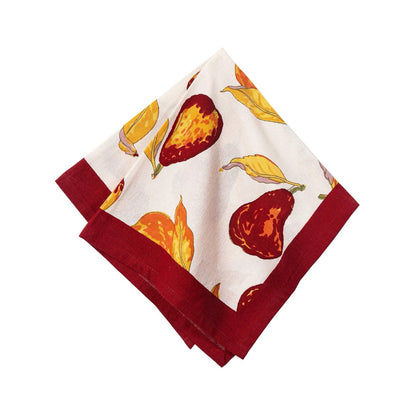 Folded napkin with pear pattern on a white background