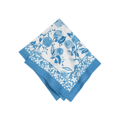 Set of blue and white patterned napkins on a white background