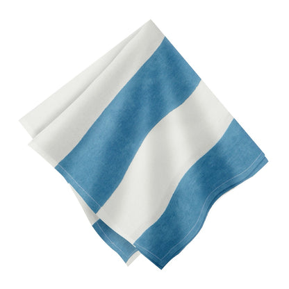 Blue and white striped towel on a white background