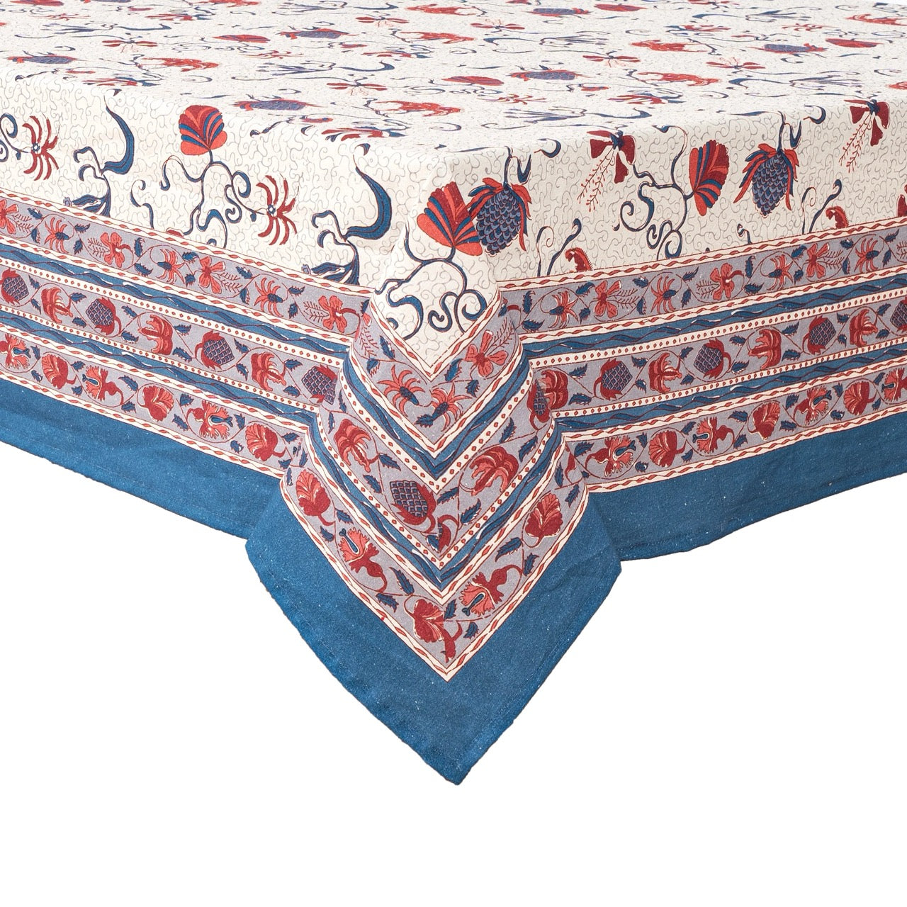 Decorative tablecloth with floral and geometric pattern on a white background