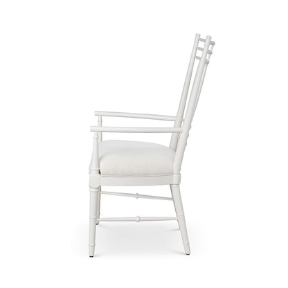 White chair with a cushion on a white background