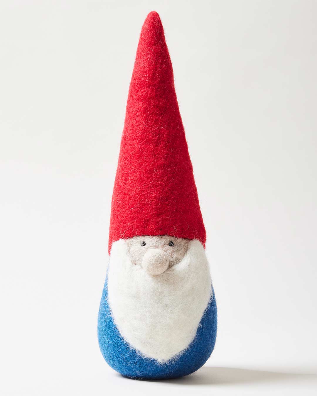 Gnome figurine with a red hat and blue body on a white background
