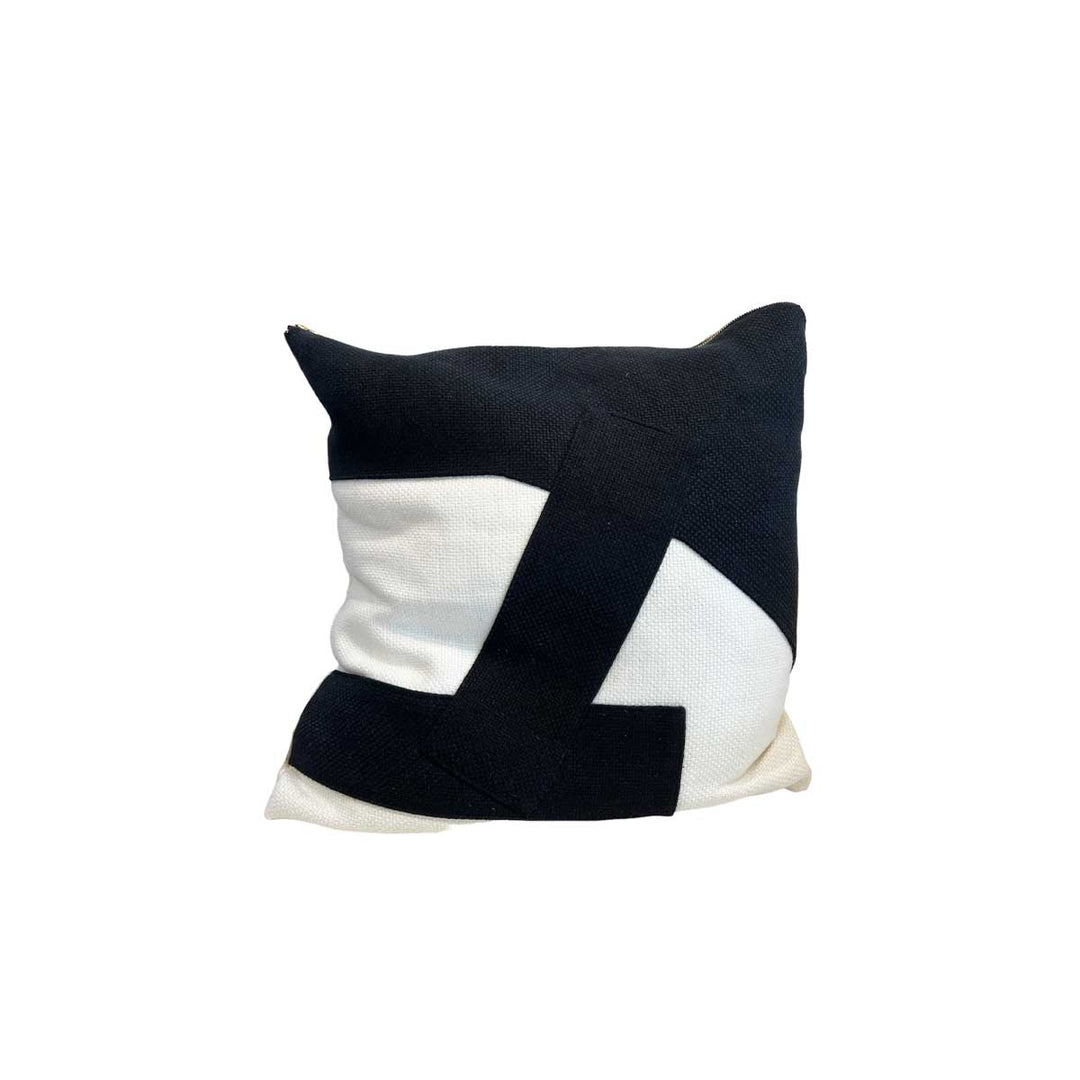 Heavy Black Belgian Linen on Oyster Throw Pillow by Tara Shaw shown with white backdrop